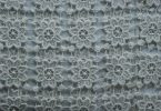 Open lace crochet mesh showing the airy filet crochet structure