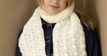 Red Heart Cable Crochet Scarf shown in the original Yarnspirations pattern photograph