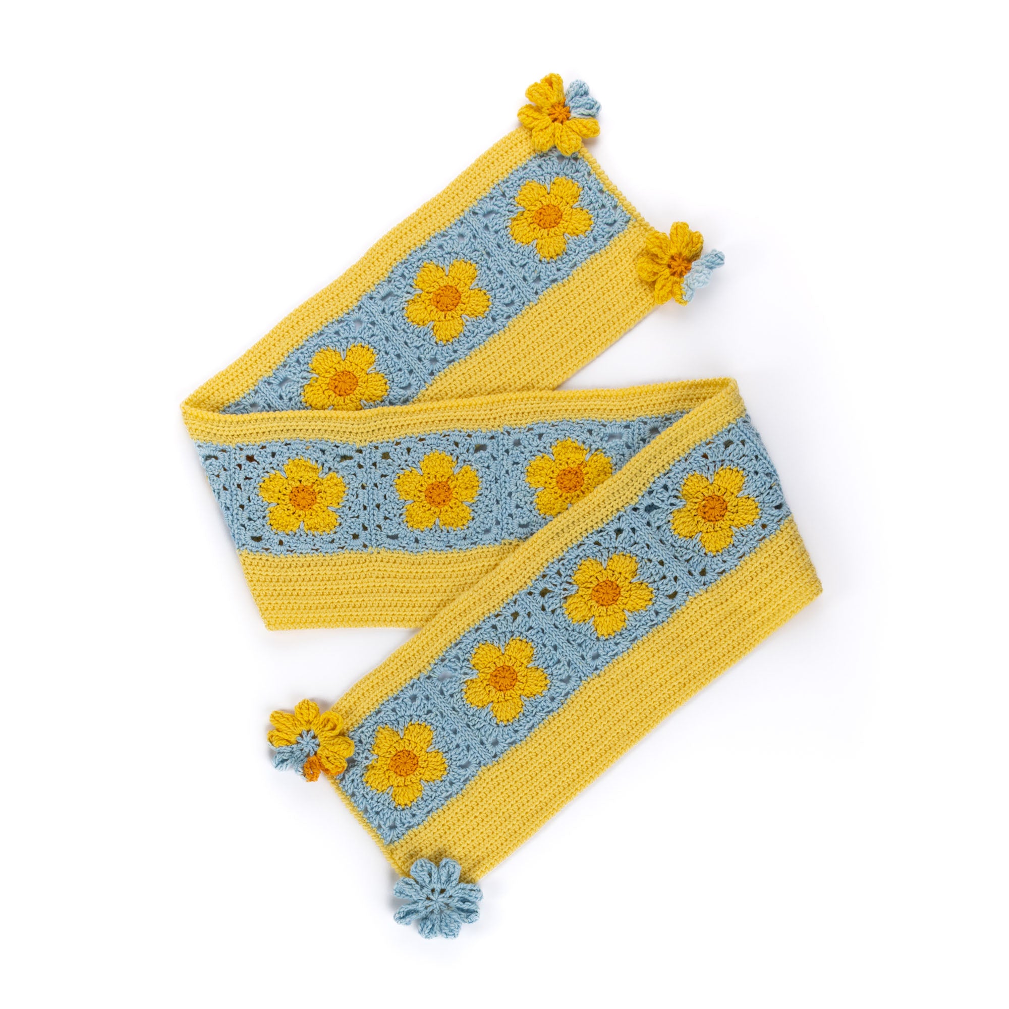Red Heart Crochet Flower Power Scarf shown in the original Yarnspirations pattern photograph