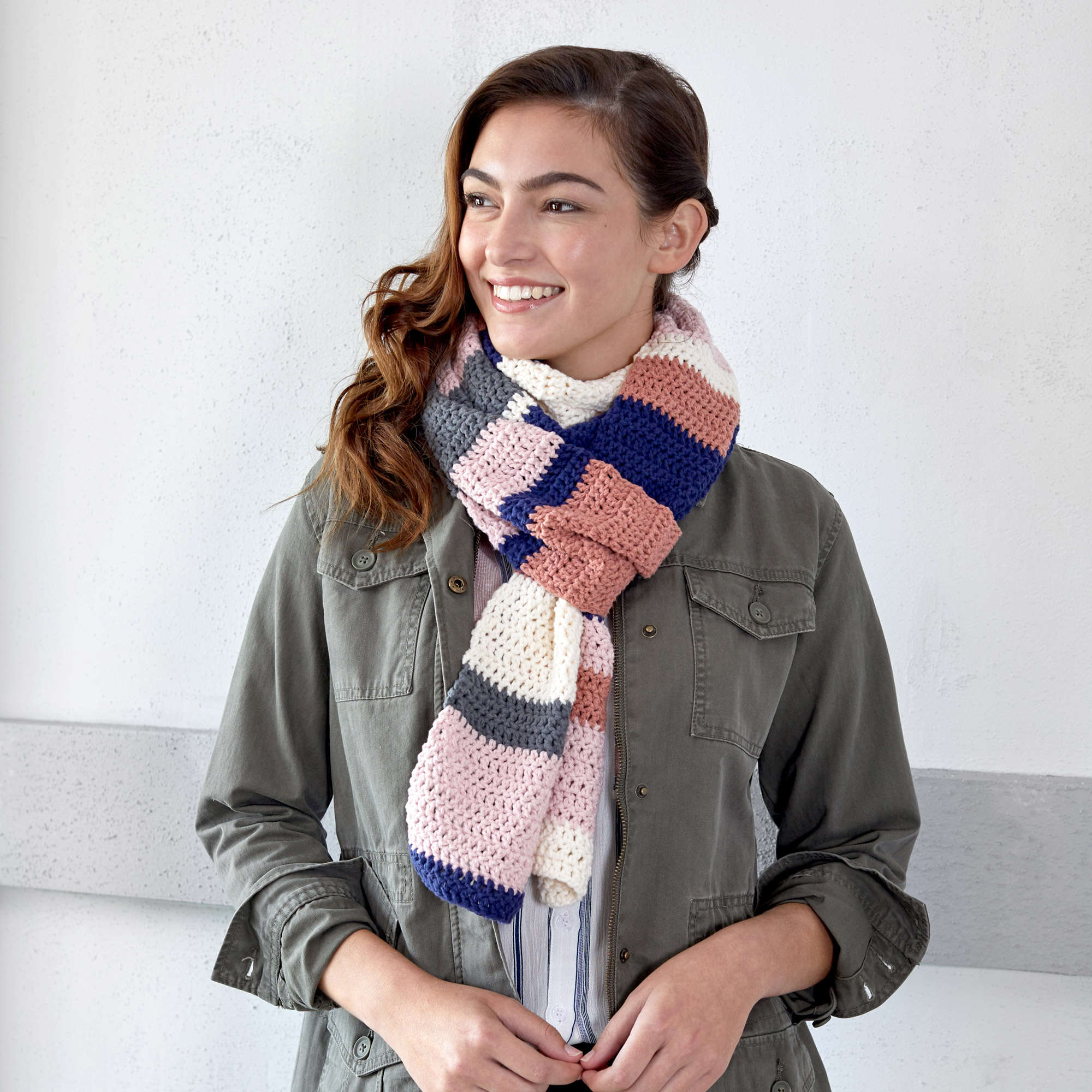 Red Heart Crochet Modern Color Block Scarf shown in the original Yarnspirations pattern photograph
