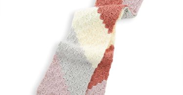 Red Heart On the Bias Crochet Scarf shown in the original Yarnspirations pattern photograph
